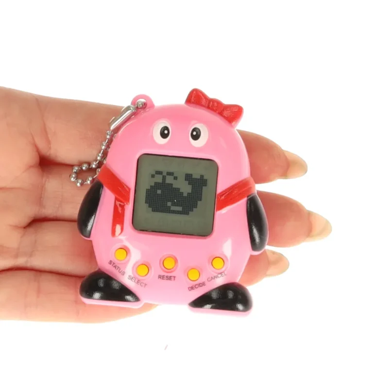 Tamagotchi, a virtuális kiskedvenc, elektronikus játék, rózsaszín, állat forma