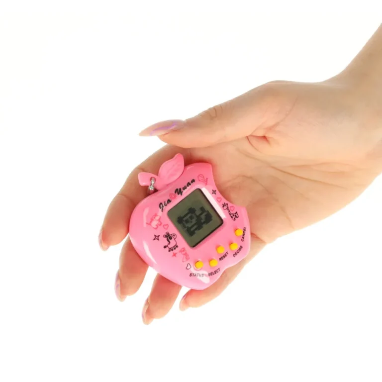 Tamagotchi, a virtuális kiskedvenc, elektronikus játék, rózsaszín, alma forma