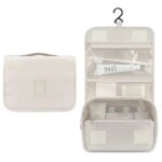 Női krémszínű feltekerhető utazó neszesszer zsebekkel, 47×24 cm